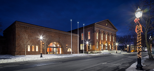 Exterior of Fitchburg City Hall at night.