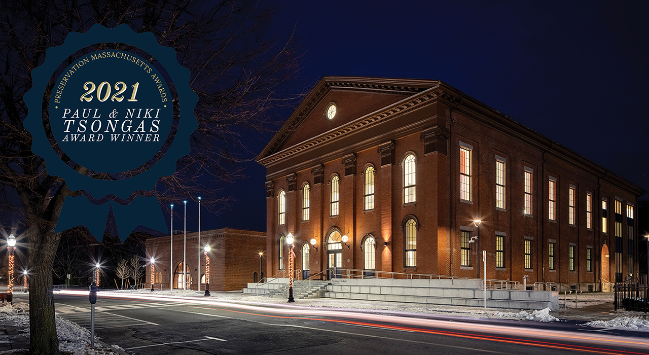 Night shot of Fitchburg City Hall with a seal for the Preservation Massachusetts Paul and Niki Tsongas award; Photographer Trent Bell